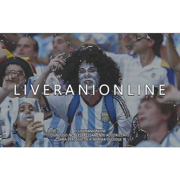 (140621) -- BELO HORIZONTE, June 21, 2014 () -- Fans of Argentina celebrates the team\'s victory over Iran during a Group F match between Argentina and Iran of 2014 FIFA World Cup at the Estadio Mineirao Stadium in Belo Horizonte, Brazil, June 21, 2014. Argentina beat Iran 1-0. (/Liu Bin)(zc) ©PHOTOSHOT/AGENZIA ALDO LIVERANI SAS - ITALY ONLY - EDITORIAL USE ONLY - ARGENTINA Vs IRAN partita del gruppo di F Coppa del mondo FIFA 2014 Mineirao stadio Estadio a Belo Horizonte, in Brasile, 21 giugno 2014