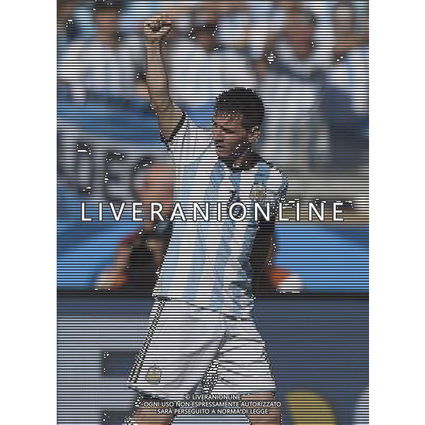 (140621) -- BELO HORIZONTE, June 21, 2014 () -- Lionel Messi of Argentina celebrates scoring during a Group F match between Argentina and Iran of 2014 FIFA World Cup at the Estadio Mineirao Stadium in Belo Horizonte, Brazil, June 21, 2014. Argentina won 1-0. (/Qi Heng)(wll) ©PHOTOSHOT/AGENZIA ALDO LIVERANI SAS - ITALY ONLY - EDITORIAL USE ONLY - ARGENTINA Vs IRAN partita del gruppo di F Coppa del mondo FIFA 2014 Mineirao stadio Estadio a Belo Horizonte, in Brasile, 21 giugno 2014