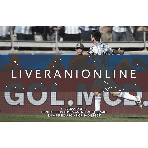 (140621) -- BELO HORIZONTE, June 21, 2014 () -- Lionel Messi of Argentina celebrates scoring during a Group F match between Argentina and Iran of 2014 FIFA World Cup at the Estadio Mineirao Stadium in Belo Horizonte, Brazil, June 21, 2014. Argentina won 1-0. (/Qi Heng)(wll) ©PHOTOSHOT/AGENZIA ALDO LIVERANI SAS - ITALY ONLY - EDITORIAL USE ONLY - ARGENTINA Vs IRAN partita del gruppo di F Coppa del mondo FIFA 2014 Mineirao stadio Estadio a Belo Horizonte, in Brasile, 21 giugno 2014
