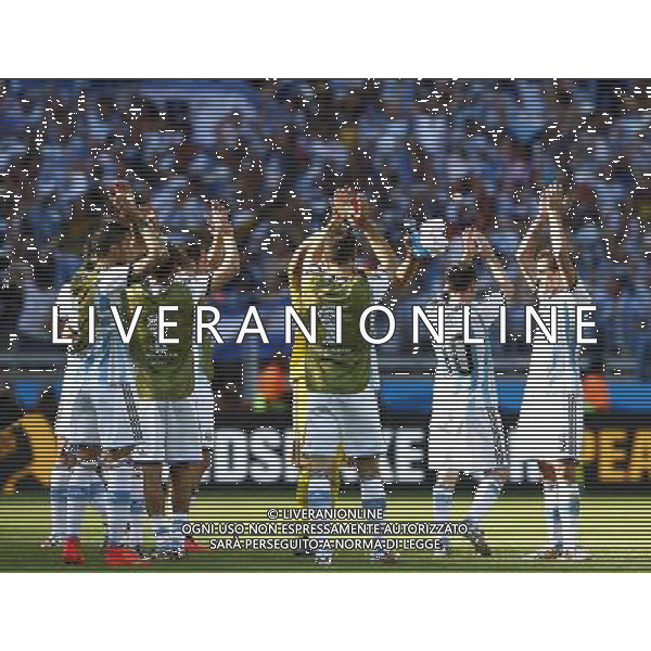 (140621) -- BELO HORIZONTE, June 21, 2014 () -- Players of Argentina greet the audience after winning a Group F match between Argentina and Iran of 2014 FIFA World Cup at the Estadio Mineirao Stadium in Belo Horizonte, Brazil, June 21, 2014. Argentina beat Iran 1-0. (/Liu Bin)(zc) ©PHOTOSHOT/AGENZIA ALDO LIVERANI SAS - ITALY ONLY - EDITORIAL USE ONLY - ARGENTINA Vs IRAN partita del gruppo di F Coppa del mondo FIFA 2014 Mineirao stadio Estadio a Belo Horizonte, in Brasile, 21 giugno 2014