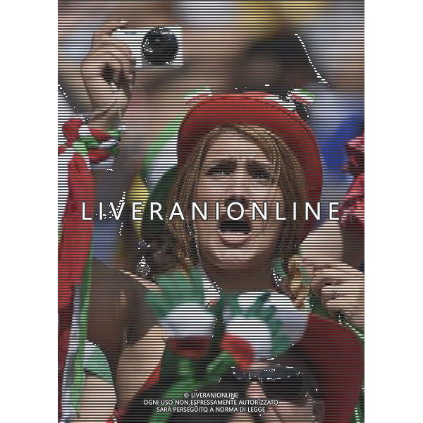 (140621) -- BELO HORIZONTE, June 21, 2014 () -- A fan of Iran cheers ahead of a Group F match between Argentina and Iran of 2014 FIFA World Cup at the Estadio Mineirao Stadium in Belo Horizonte, Brazil, June 21, 2014. (/Qi Heng)(wll) (SP)BRAZIL-BELO HORIZONTE-WORLD CUP 2014-GROUP F-ARGENTINA VS IRAN-FANS PUBLICATIONxNOTxINxCHN Belo Horizons June 21 2014 A supporter of Iran Cheers Ahead of A Group F Match between Argentina and Iran of 2014 FIFA World Cup AT The Estadio Mineirao Stage in Belo Horizons Brazil June 21 2014 Qi Heng SP Brazil Belo Horizons World Cup 2014 Group F Argentina vs Iran supporters PUBLICATIONxNOTxINxCHN ©PHOTOSHOT/AGENZIA ALDO LIVERANI SAS - ITALY ONLY - EDITORIAL USE ONLY - ARGENTINA Vs IRAN partita del gruppo di F Coppa del mondo FIFA 2014 Mineirao stadio Estadio a Belo Horizonte, in Brasile, 21 giugno 2014