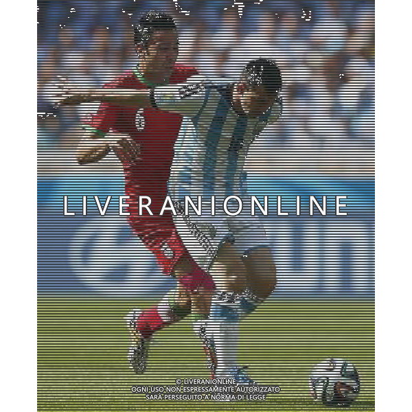 (140621) -- BELO HORIZONTE, June 21, 2014 () -- Javad Nekounam (L) of Iran defends against Lionel Messi of Argentina during a Group F match between Argentina and Iran of 2014 FIFA World Cup at the Estadio Mineirao Stadium in Belo Horizonte, Brazil, June 21, 2014. (/Liu Bin)(zc) (SP)BRAZIL-BELO HORIZONTE-WORLD CUP 2014-GROUP F-ARGENTINA VS IRAN PUBLICATIONxNOTxINxCHN Belo Horizons June 21 2014 Javad Nekounam l of Iran Defends Against Lionel Messi of Argentina during A Group F Match between Argentina and Iran of 2014 FIFA World Cup AT The Estadio Mineirao Stage in Belo Horizons Brazil June 21 2014 Liu am ZC SP Brazil Belo Horizons World Cup 2014 Group F Argentina vs Iran PUBLICATIONxNOTxINxCHN ©PHOTOSHOT/AGENZIA ALDO LIVERANI SAS - ITALY ONLY - EDITORIAL USE ONLY - ARGENTINA Vs IRAN partita del gruppo di F Coppa del mondo FIFA 2014 Mineirao stadio Estadio a Belo Horizonte, in Brasile, 21 giugno 2014