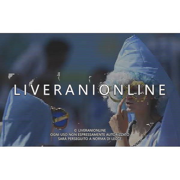 (140621) -- BELO HORIZONTE, June 21, 2014 () -- Two young fans of Argentina chat ahead of a Group F match between Argentina and Iran of 2014 FIFA World Cup at the Estadio Mineirao Stadium in Belo Horizonte, Brazil, June 21, 2014. (/Qi Heng)(wll) ©PHOTOSHOT/AGENZIA ALDO LIVERANI SAS - ITALY ONLY - EDITORIAL USE ONLY - ARGENTINA Vs IRAN partita del gruppo di F Coppa del mondo FIFA 2014 Mineirao stadio Estadio a Belo Horizonte, in Brasile, 21 giugno 2014