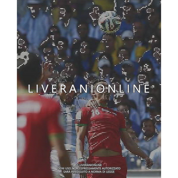 (140621) -- BELO HORIZONTE, June 21, 2014 () -- Reza Ghoochannejad £ÂR£©of Iran fights for a header during a Group F match between Argentina and Iran of 2014 FIFA World Cup at the Estadio Mineirao Stadium in Belo Horizonte, Brazil, June 21, 2014. (/Liu Bin)(zc) ©PHOTOSHOT/AGENZIA ALDO LIVERANI SAS - ITALY ONLY - EDITORIAL USE ONLY - ARGENTINA Vs IRAN partita del gruppo di F Coppa del mondo FIFA 2014 Mineirao stadio Estadio a Belo Horizonte, in Brasile, 21 giugno 2014