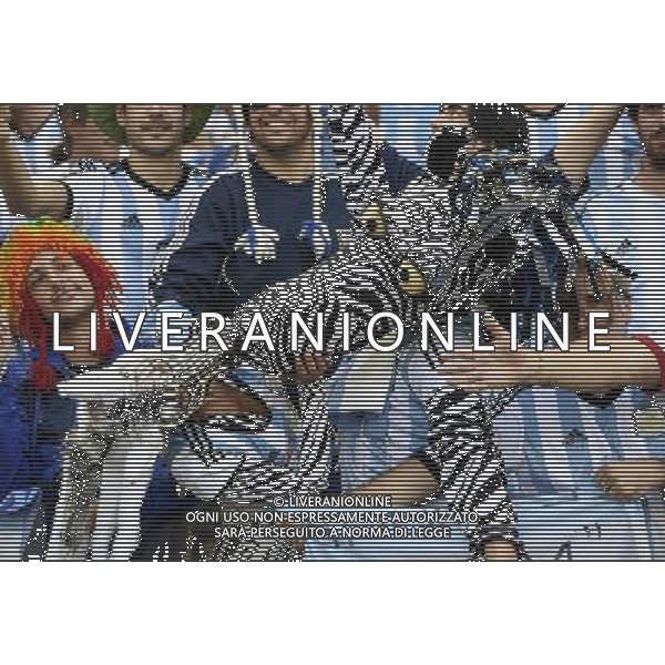 (140621) -- BELO HORIZONTE, June 21, 2014 () -- Fans of Argentina cheer ahead of a Group F match between Argentina and Iran of 2014 FIFA World Cup at the Estadio Mineirao Stadium in Belo Horizonte, Brazil, June 21, 2014. (/Qi Heng)(wll) ©PHOTOSHOT/AGENZIA ALDO LIVERANI SAS - ITALY ONLY - EDITORIAL USE ONLY - ARGENTINA Vs IRAN partita del gruppo di F Coppa del mondo FIFA 2014 Mineirao stadio Estadio a Belo Horizonte, in Brasile, 21 giugno 2014