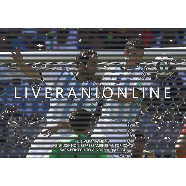 (140621) -- BELO HORIZONTE, June 21, 2014 () -- Gonzalo Higuain (L) and Fernando Gago of Argentina jump for a header during a Group F match between Argentina and Iran of 2014 FIFA World Cup at the Estadio Mineirao Stadium in Belo Horizonte, Brazil, June 21, 2014. (/Liu Bin)(zc) ©PHOTOSHOT/AGENZIA ALDO LIVERANI SAS - ITALY ONLY - EDITORIAL USE ONLY - ARGENTINA Vs IRAN partita del gruppo di F Coppa del mondo FIFA 2014 Mineirao stadio Estadio a Belo Horizonte, in Brasile, 21 giugno 2014