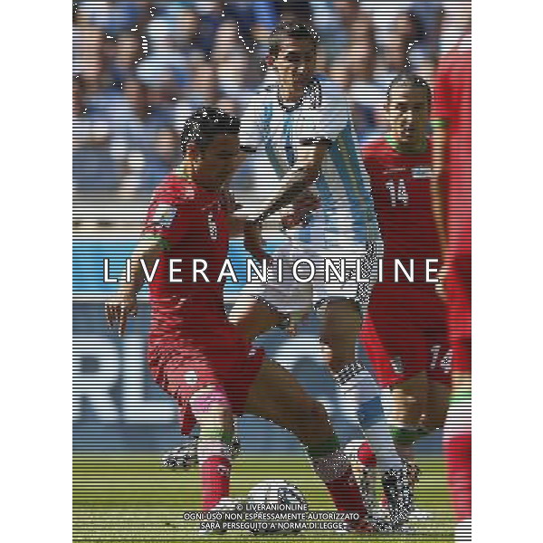 (140621) -- BELO HORIZONTE, June 21, 2014 () -- Angel Di Maria (C) of Argentina vies with Javad Nekounam (L) of Iran during a Group F match between Argentina and Iran of 2014 FIFA World Cup at the Estadio Mineirao Stadium in Belo Horizonte, Brazil, June 21, 2014. (/Liu Bin)(zc) ©photoshot/AGENZIA ALDO LIVERANI SAS - ITALY ONLY - ARGENTINA Vs IRAN partita del gruppo di F Coppa del mondo FIFA 2014 Mineirao stadio Estadio a Belo Horizonte, in Brasile, 21 giugno 2014