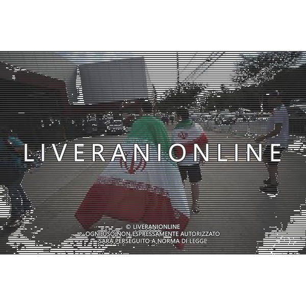 (140621) -- BELO HORIZONTE, June 21, 2014 () -- Iran\'s fans arrive at the Estadio Minerao Stadium to watch a Group F match between Argentina and Iran of 2014 FIFA World Cup, Belo Horizonte, in Brazil, June 21, 2014. (/Mauricio Valenzuela) (mv) ©photoshot/AGENZIA ALDO LIVERANI SAS - ITALY ONLY - ARGENTINA Vs IRAN partita del gruppo di F Coppa del mondo FIFA 2014 Mineirao stadio Estadio a Belo Horizonte, in Brasile, 21 giugno 2014