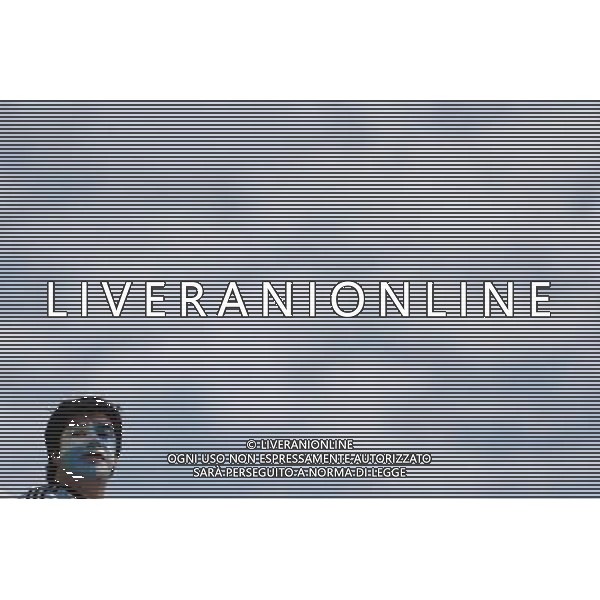 (140621) -- BELO HORIZONTE, June 21, 2014 () -- An Argentina\'s fan is seen arriving at the Estadio Minerao Stadium to watch a Group F match between Argentina and Iran of 2014 FIFA World Cup, Belo Horizonte, in Brazil, June 21, 2014. (/Mauricio Valenzuela) (mv) ©photoshot/AGENZIA ALDO LIVERANI SAS - ITALY ONLY - ARGENTINA Vs IRAN partita del gruppo di F Coppa del mondo FIFA 2014 Mineirao stadio Estadio a Belo Horizonte, in Brasile, 21 giugno 2014