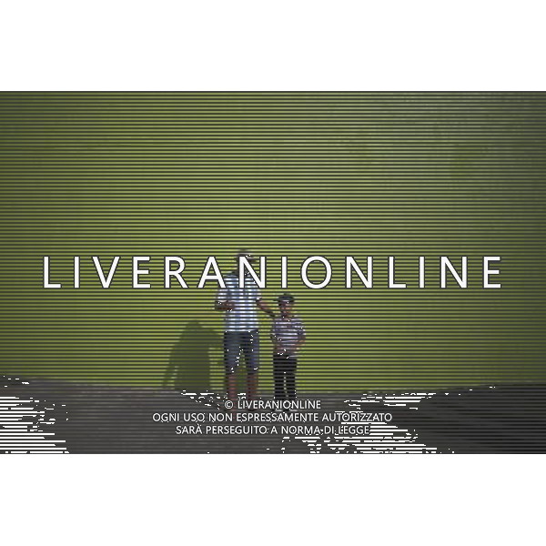 (140621) -- BELO HORIZONTE, June 21, 2014 () -- Argentina\'s fans arrive at the Estadio Minerao Stadium to watch a Group F match between Argentina and Iran of 2014 FIFA World Cup, Belo Horizonte, in Brazil, June 21, 2014. (/Mauricio Valenzuela) (mv) ©photoshot/AGENZIA ALDO LIVERANI SAS - ITALY ONLY - ARGENTINA Vs IRAN partita del gruppo di F Coppa del mondo FIFA 2014 Mineirao stadio Estadio a Belo Horizonte, in Brasile, 21 giugno 2014