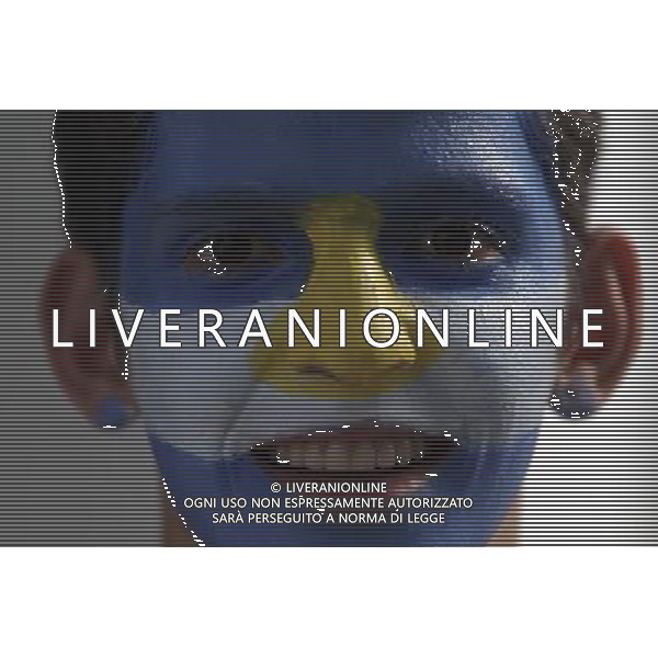 (140621) -- BELO HORIZONTE, June 21, 2014 () -- An Argentina\'s fan is seen outside the Estadio Minerao Stadium to watch a Group F match between Argentina and Iran of 2014 FIFA World Cup, Belo Horizonte, in Brazil, June 21, 2014. (/Mauricio Valenzuela) (mv) ©photoshot/AGENZIA ALDO LIVERANI SAS - ITALY ONLY - ARGENTINA Vs IRAN partita del gruppo di F Coppa del mondo FIFA 2014 Mineirao stadio Estadio a Belo Horizonte, in Brasile, 21 giugno 2014