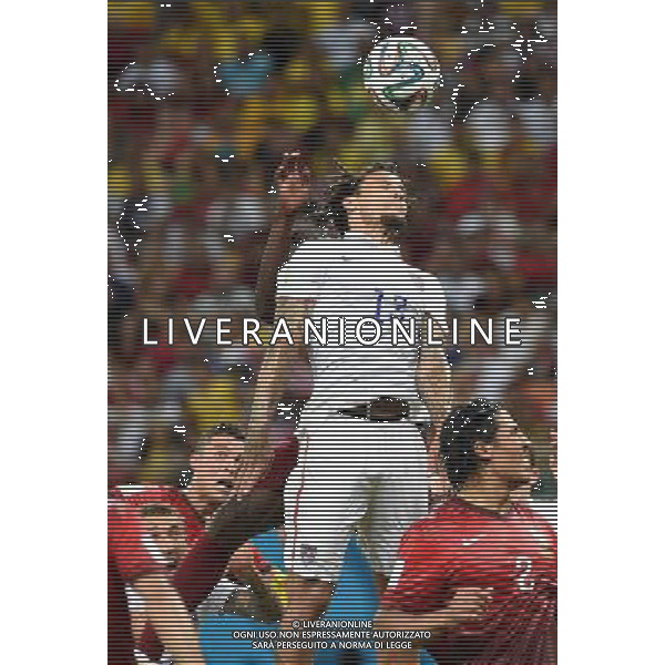 (140622) -- MANAUS, June 22, 2014 () -- Jermaine Jones of the U.S. competes for a header during a Group G match between U.S. and Portugal of 2014 FIFA World Cup at the Arena Amazonia Stadium in Manaus, Brazil, June 22, 2014. U.S. drew 2-2 with Portugal on Sunday.(/Liu Dawei) ©PHOTOSHOT/Agenzia Aldo Liverani sas - ITALY ONLY - EDITORIAL USE ONLY