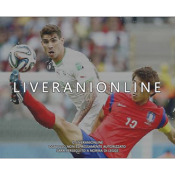 (140622) -- PORTO ALEGRE, June 22, 2014 () -- Korea Republic\'s Park Chu Young vies for the ball with Algeria\'s Carl Medjani during a Group H match between Korea Republic and Algeria of 2014 FIFA World Cup at the Estadio Beira-Rio Stadium in Porto Alegre, Brazil, June 22, 2014.(/Chen Jianli) ©PHOTOSHOT/Agenzia Aldo Liverani sas - ITALY ONLY - EDITORIAL USE ONLY