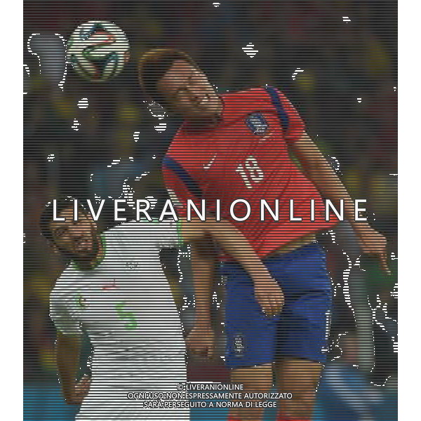 (140622) -- PORTO ALEGRE, June 22, 2014 () -- Kim Shin Wook£®R£©of Korea Republic fights for the header with Rafik Halliche of Algeria during a Group H match between Korea Republic and Algeria of 2014 FIFA World Cup at the Estadio Beira-Rio Stadium in Porto Alegre, Brazil, June 22, 2014. Algeria beat Korea Republic 4-2. (/Li Ga)(zc) ©PHOTOSHOT/Agenzia Aldo Liverani sas - ITALY ONLY - EDITORIAL USE ONLY