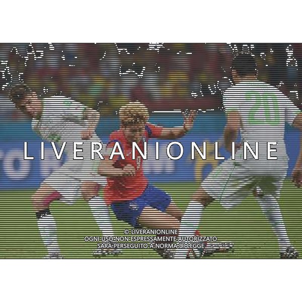(140622) -- PORTO ALEGRE, June 22, 2014 () -- Son Heung Min (L) of Korea Republic vies with Carl Medjani of Algeria during a Group H match between Korea Republic and Algeria of 2014 FIFA World Cup at the Estadio Beira-Rio Stadium in Porto Alegre, Brazil, June 22, 2014. Algeria beat Korea Republic 4-2. (/Li Ga)(zc) ©PHOTOSHOT/Agenzia Aldo Liverani sas - ITALY ONLY - EDITORIAL USE ONLY