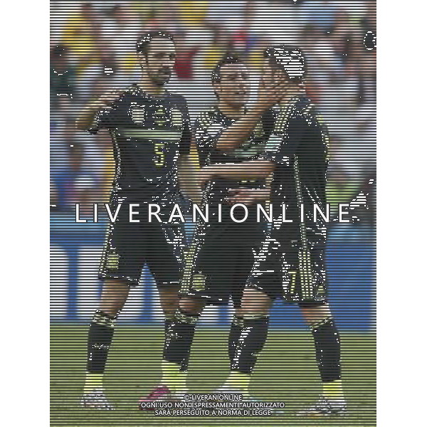 (140623) -- CURITIBA, June 23, 2014 () -- Spain\'s David Villa (R) celebrates a goal during a Group B match between Australia and Spain of 2014 FIFA World Cup at the Arena da Baixada Stadium in Curitiba, Brazil, on June 23, 2014.Spain won 3-0 over Australia on Monday. (/Liao Yujie)(pcy) ©PHOTOSHOT/Agenzia Aldo Liverani sas - ITALY ONLY - EDITORIAL USE ONLY - AUSTRALIA Vs SPAGNA partita del Gruppo B 2014 FIFA Coppa del Mondo Arena da Baixada allo stadio di Curitiba, in Brasile, il 23 giugno, 2014