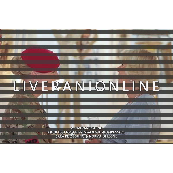 London, UK, 24/06/2014 : THE DUCHESS OF CORNWALL VISITS THE \'VOICES FROM THE DESERT\' EXHIBITION. The Duchess of Cornwall, Patron, Desert Rats Association, visits \'Voices from the Desert\', a Desert Rats exhibition by the artist Anna Redwood. The Duchess is pictured with Corporal Chelsea Williams . Picture by Julie Edwards ©PHOTOSHOT/Agenzia Aldo Liverani sas - ITALY ONLY - EDITORIAL USE ONLY - REALI INGLESI: Camilla duchessa di Cornovaglia in visita alla mostra \'Voci dal deserto\' dell\'artista Anna Redwood