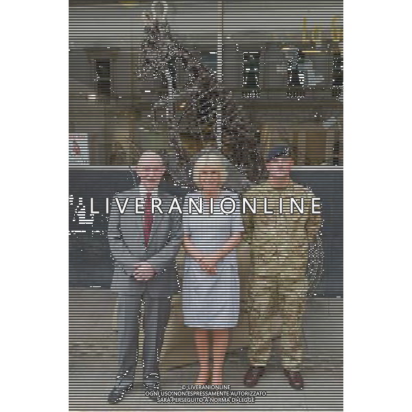 London, UK, 24/06/2014 : THE DUCHESS OF CORNWALL VISITS THE \'VOICES FROM THE DESERT\' EXHIBITION. The Duchess of Cornwall, Patron, Desert Rats Association, visits \'Voices from the Desert\', a Desert Rats exhibition by the artist Anna Redwood. The exhibition features an 11ft high, heavy-metal RAT sculpture - designed and constructed by Anna from scrapped vehicles found in the desert. The British Army has transported this regimental mascot all the way back from Camp Bastion and it will be on display at the La Galleria Pall Mall for this exhibition before it is moved to a permanent home with the 7th Armoured Brigade - The Desert Rats.. Picture by Julie Edwards ©PHOTOSHOT/Agenzia Aldo Liverani sas - ITALY ONLY - EDITORIAL USE ONLY - REALI INGLESI: Camilla duchessa di Cornovaglia in visita alla mostra \'Voci dal deserto\' dell\'artista Anna Redwood