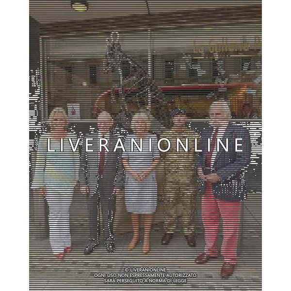 London, UK, 24/06/2014 : THE DUCHESS OF CORNWALL VISITS THE \'VOICES FROM THE DESERT\' EXHIBITION. The Duchess of Cornwall, Patron, Desert Rats Association, visits \'Voices from the Desert\', a Desert Rats exhibition by the artist Anna Redwood. The exhibition features an 11ft high, heavy-metal RAT sculpture - designed and constructed by Anna from scrapped vehicles found in the desert. The British Army has transported this regimental mascot all the way back from Camp Bastion and it will be on display at the La Galleria Pall Mall for this exhibition before it is moved to a permanent home with the 7th Armoured Brigade - The Desert Rats.. Picture by Julie Edwards ©PHOTOSHOT/Agenzia Aldo Liverani sas - ITALY ONLY - EDITORIAL USE ONLY - REALI INGLESI: Camilla duchessa di Cornovaglia in visita alla mostra \'Voci dal deserto\' dell\'artista Anna Redwood