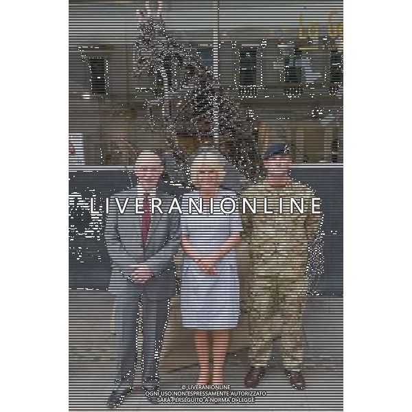London, UK, 24/06/2014 : THE DUCHESS OF CORNWALL VISITS THE \'VOICES FROM THE DESERT\' EXHIBITION. The Duchess of Cornwall, Patron, Desert Rats Association, visits \'Voices from the Desert\', a Desert Rats exhibition by the artist Anna Redwood. The exhibition features an 11ft high, heavy-metal RAT sculpture - designed and constructed by Anna from scrapped vehicles found in the desert. The British Army has transported this regimental mascot all the way back from Camp Bastion and it will be on display at the La Galleria Pall Mall for this exhibition before it is moved to a permanent home with the 7th Armoured Brigade - The Desert Rats.. Picture by Julie Edwards ©PHOTOSHOT/Agenzia Aldo Liverani sas - ITALY ONLY - EDITORIAL USE ONLY - REALI INGLESI: Camilla duchessa di Cornovaglia in visita alla mostra \'Voci dal deserto\' dell\'artista Anna Redwood