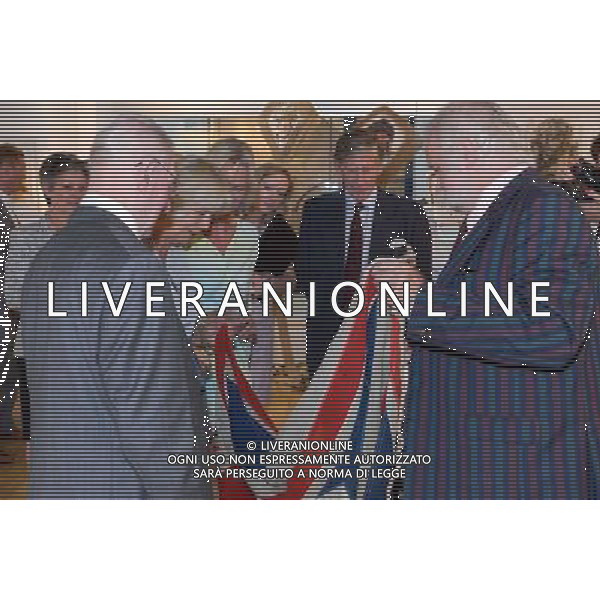 London, UK, 24/06/2014 : THE DUCHESS OF CORNWALL VISITS THE \'VOICES FROM THE DESERT\' EXHIBITION. The Duchess of Cornwall, Patron, Desert Rats Association, visits \'Voices from the Desert\', a Desert Rats exhibition by the artist Anna Redwood. . ©PHOTOSHOT/Agenzia Aldo Liverani sas - ITALY ONLY - EDITORIAL USE ONLY - REALI INGLESI: Camilla duchessa di Cornovaglia in visita alla mostra \'Voci dal deserto\' dell\'artista Anna Redwood