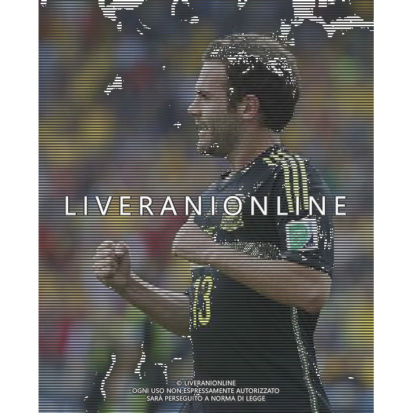 (140623) -- CURITIBA, June 23, 2014 () -- Spain\'s Juan Mata celebrates for his goal during a Group B match between Australia and Spain of 2014 FIFA World Cup at the Arena da Baixada Stadium in Curitiba, Brazil, on June 23, 2014.Spain won 3-0 over Australia on Monday. (/Liao Yujie)(pcy) ©photoshot/Agenzia Aldo Liverani sas - ITALY ONLY - EDITORIAL USE ONLY