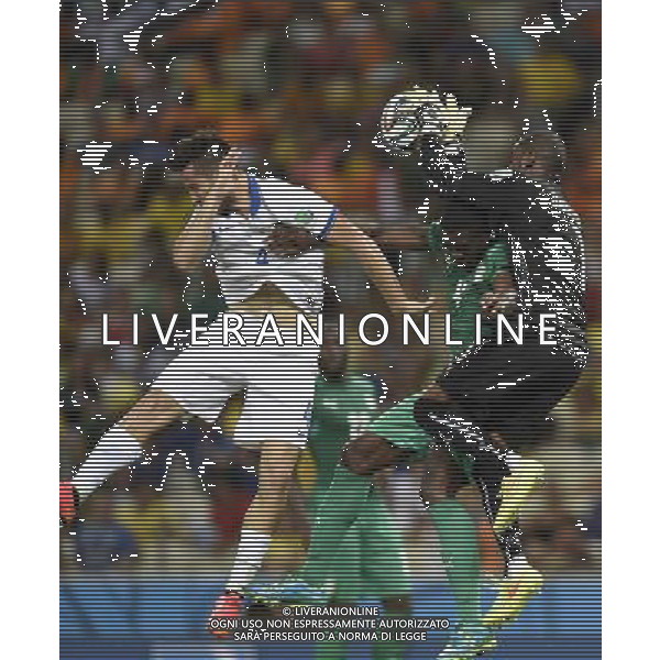 (140624) -- FORTALEZA, June 24, 2014 () -- Cote d\'Ivoire\'s goalkeeper Boubacar Barry (1st R) blocks the ball during a Group C match between Greece and Cote d\'Ivoire of 2014 FIFA World Cup at the Estadio Castelao Stadium in Fortaleza, Brazil, June 24, 2014. (/Yang Lei)(xzj) AG ALDO LIVERANI SAS ONLY ITALY