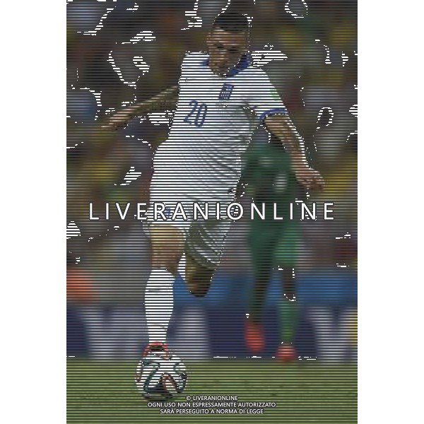(140624) -- FORTALEZA, June 24, 2014 () -- Greece\'s Jose Cholevas breaks through during a Group C match between Greece and Cote d\'Ivoire of 2014 FIFA World Cup at the Estadio Castelao Stadium in Fortaleza, Brazil, June 24, 2014. (/Yang Lei)(xzj) AG ALDO LIVERANI SAS ONLY ITALY