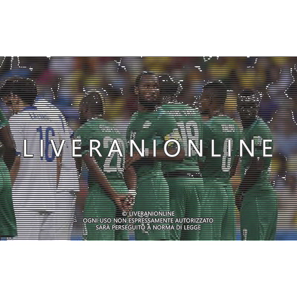 (140624) -- FORTALEZA, June 24, 2014 () -- Greece\'s Didier Drogba (3rd L) looks back as he forms a wall with other players during a Group C match between Greece and Cote d\'Ivoire of 2014 FIFA World Cup at the Estadio Castelao Stadium in Fortaleza, Brazil, June 24, 2014. (/Yang Lei)(xzj) AG ALDO LIVERANI SAS ONLY ITALY