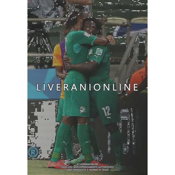 (140624) -- FORTALEZA, June 24, 2014 () -- Cote d\'Ivoire\'s Wilfried Bony (R) hugs Didier Drogba (L) as he celebrating a goal during a Group C match between Greece and Cote d\'Ivoire of 2014 FIFA World Cup at the Estadio Castelao Stadium in Fortaleza, Brazil, June 24, 2014. (/Cao Can)(xzj) AG ALDO LIVERANI SAS ONLY ITALY