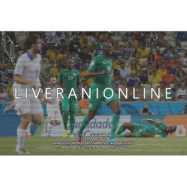 (140624) -- FORTALEZA, June 24, 2014 () -- Cote d\'Ivoire\'s Didier Drogba (1st R) falls on the ground during a Group C match between Greece and Cote d\'Ivoire of 2014 FIFA World Cup at the Estadio Castelao Stadium in Fortaleza, Brazil, June 24, 2014. (/Cao Can)(xzj) AG ALDO LIVERANI SAS ONLY ITALY