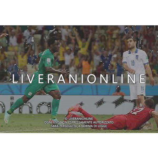 (140624) -- FORTALEZA, June 24, 2014 () -- Cote d\'Ivoire\'s Wilfried Bony (L) reacts after scoring a goal during a Group C match between Greece and Cote d\'Ivoire of 2014 FIFA World Cup at the Estadio Castelao Stadium in Fortaleza, Brazil, June 24, 2014. (/Cao Can)(xzj) AG ALDO LIVERANI SAS ONLY ITALY