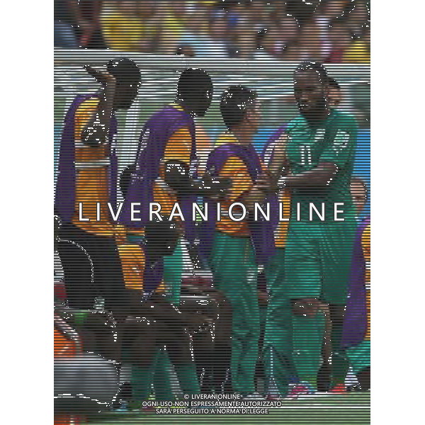 (140624) -- FORTALEZA, June 24, 2014 () -- Cote d\'Ivoire\'s Didier Drogba (1st R) greet his teammates after being replaced during a Group C match between Greece and Cote d\'Ivoire of 2014 FIFA World Cup at the Estadio Castelao Stadium in Fortaleza, Brazil, June 24, 2014. (/Cao Can)(xzj) AG ALDO LIVERANI SAS ONLY ITALY