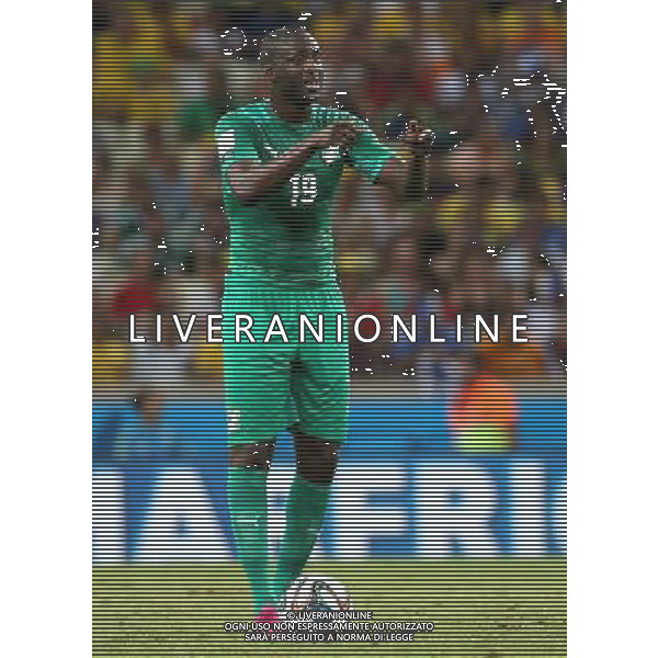 (140624) -- FORTALEZA, June 24, 2014 () -- Cote d\'Ivoire\'s Yaya Toure reacts prior to a free kick during a Group C match between Greece and Cote d\'Ivoire of 2014 FIFA World Cup at the Estadio Castelao Stadium in Fortaleza, Brazil, June 24, 2014. Greece won 2-1 over Cote d\'Ivoire on Tuesday. (/Cao Can)(xzj) AG ALDO LIVERANI SAS ONLY ITALY