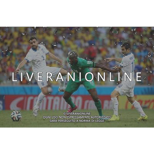 (140624) -- FORTALEZA, June 24, 2014 () -- Cote d\'Ivoire\'s Didier Drogba breaks through during a Group C match between Greece and Cote d\'Ivoire of 2014 FIFA World Cup at the Estadio Castelao Stadium in Fortaleza, Brazil, June 24, 2014. Greece won 2-1 over Cote d\'Ivoire on Tuesday. (/Cao Can)(xzj) AG ALDO LIVERANI SAS ONLY ITALY