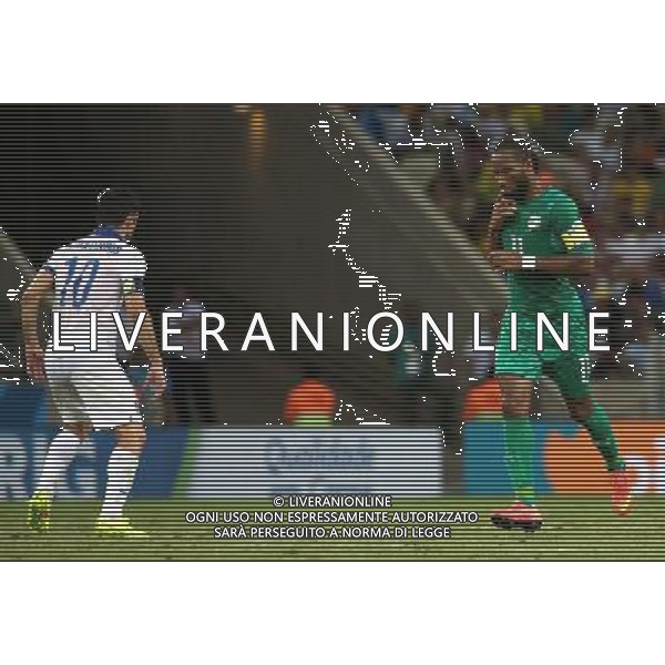 (140624) -- FORTALEZA, June 24, 2014 () -- Cote d\'Ivoire\'s Didier Drogba (R) reacts during a Group C match between Greece and Cote d\'Ivoire of 2014 FIFA World Cup at the Estadio Castelao Stadium in Fortaleza, Brazil, June 24, 2014. Greece won 2-1 over Cote d\'Ivoire on Tuesday. (/Cao Can)(xzj) AG ALDO LIVERANI SAS ONLY ITALY