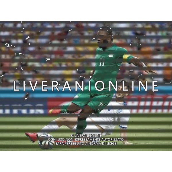 (140624) -- FORTALEZA, June 24, 2014 () -- Cote d\'Ivoire\'s Didier Drogba (front) breaks through during a Group C match between Greece and Cote d\'Ivoire of 2014 FIFA World Cup at the Estadio Castelao Stadium in Fortaleza, Brazil, June 24, 2014. (/Cao Can)(xzj) AG ALDO LIVERANI SAS ONLY ITALY
