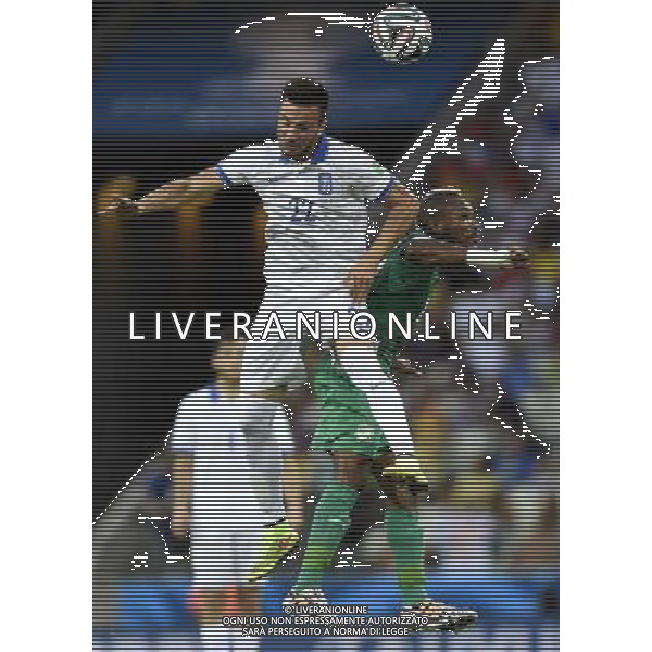 (140624) -- FORTALEZA, June 24, 2014 () -- Greece\'s Andreas Samaris (L) competes for a header with Cote d\'Ivoire\'s Geoffroy Serey Die during a Group C match between Greece and Cote d\'Ivoire of 2014 FIFA World Cup at the Estadio Castelao Stadium in Fortaleza, Brazil, June 24, 2014. (/Yang Lei)(xzj) AG ALDO LIVERANI SAS ONLY ITALY