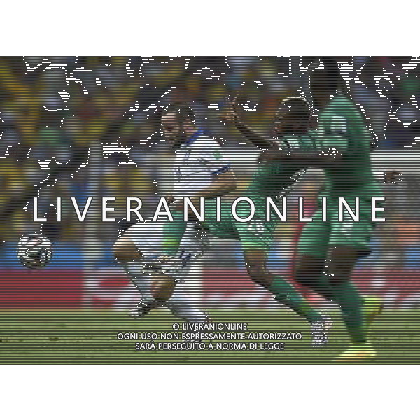 (140624) -- FORTALEZA, June 24, 2014 () -- Greece\'s Dimitris Salpingidis (L) vies with Cote d\'Ivoire\'s Geoffroy Serey Die (C) during a Group C match between Greece and Cote d\'Ivoire of 2014 FIFA World Cup at the Estadio Castelao Stadium in Fortaleza, Brazil, June 24, 2014. (/Yang Lei)(xzj) AG ALDO LIVERANI SAS ONLY ITALY