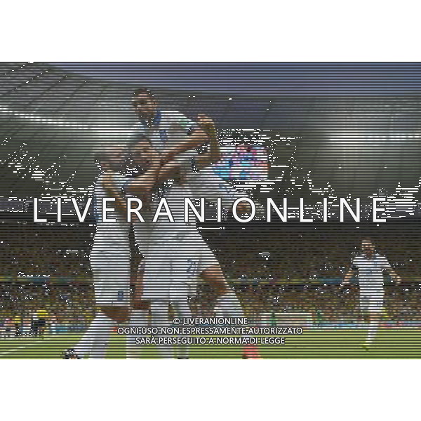 (140624) -- FORTALEZA, June 24, 2014 () -- Greece\'s Andreas Samaris (C) celebrates with his teammates after a goal during a Group C match between Greece and Cote d\'Ivoire of 2014 FIFA World Cup at the Estadio Castelao Stadium in Fortaleza, Brazil, June 24, 2014. (/Yang Lei)(xzj) AG ALDO LIVERANI SAS ONLY ITALY