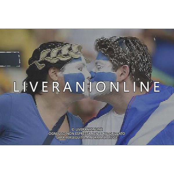 (140624) -- FORTALEZA, June 24, 2014 () -- Greece\'s fans kiss prior to a Group C match between Greece and Cote d\'Ivoire of 2014 FIFA World Cup at the Estadio Castelao Stadium in Fortaleza, Brazil, June 24, 2014. (/Yang Lei)(xzj) AG ALDO LIVERANI SAS ONLY ITALY