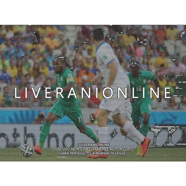 (140624) -- FORTALEZA, June 24, 2014 () -- Cote d\'Ivoire\'s Didier Drogba (L) runs with the ball during a Group C match between Greece and Cote d\'Ivoire of 2014 FIFA World Cup at the Estadio Castelao Stadium in Fortaleza, Brazil, June 24, 2014. (/Cao Can)(xzj) AG ALDO LIVERANI SAS ONLY ITALY