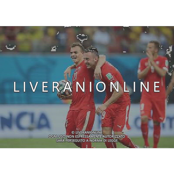 (140625) -- MANAUS, June 25, 2014 () -- Switzerland\'s Xherdan Shaqiri (L, front) celebrates the victory after a Group E match between Honduras and Switzerland of 2014 FIFA World Cup at the Arena Amazonia Stadium in Manaus, Brazil, on June 25, 2014. Switzerland won 3-0 over Honduras on Wednesday. (/Li Ming)(pcy) AG ALDO LIVERANI SAS ONLY ITALY