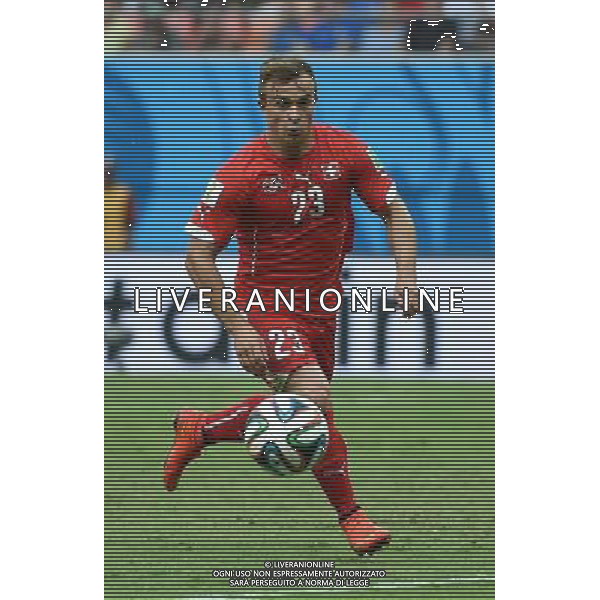 (140625) -- MANAUS, June 25, 2014 () -- Switzerland\'s Xherdan Shaqiri runs with the ball during a Group E match between Honduras and Switzerland of 2014 FIFA World Cup at the Arena Amazonia Stadium in Manaus, Brazil, on June 25, 2014.(/Liu Dawei)(pcy) AG ALDO LIVERANI SAS ONLY ITALY