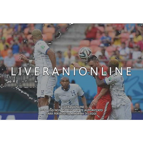 (140625) -- MANAUS, June 25, 2014 () -- Switzerland\'s Josip Drmic (2nd R) heads the ball during a Group E match between Honduras and Switzerland of 2014 FIFA World Cup at the Arena Amazonia Stadium in Manaus, Brazil, on June 25, 2014.(/Liu Dawei)(pcy) AG ALDO LIVERANI SAS ONLY ITALY