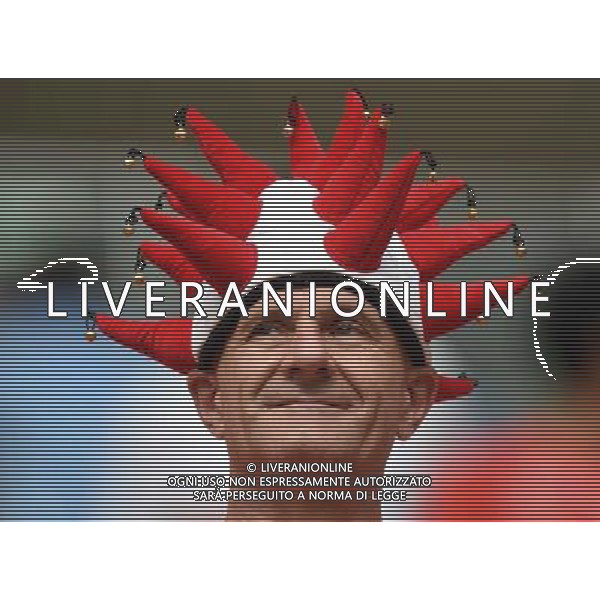 (140625) -- MANAUS, June 25, 2014 () -- A supporter of Switzerland is seen before a Group E match between Honduras and Switzerland of 2014 FIFA World Cup at the Arena Amazonia Stadium in Manaus, Brazil, on June 25, 2014.(/Liu Dawei)(pcy) AG ALDO LIVERANI SAS ONLY ITALY