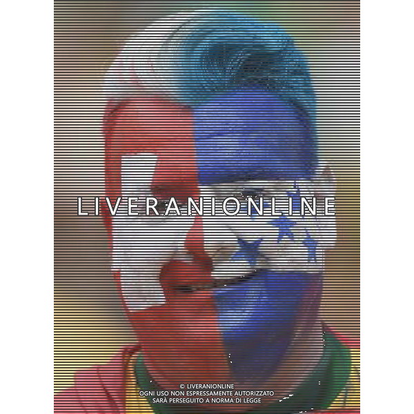 (140625) -- MANAUS, June 25, 2014 () -- A football fan poses before a Group E match between Honduras and Switzerland of 2014 FIFA World Cup at the Arena Amazonia Stadium in Manaus, Brazil, on June 25, 2014.(/Liu Dawei)(pcy) AG ALDO LIVERANI SAS ONLY ITALY