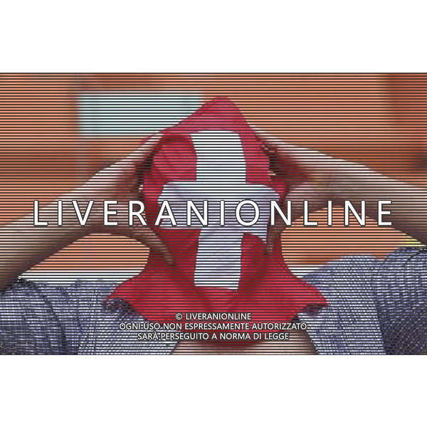 (140625) -- MANAUS, June 25, 2014 () -- A supporter of Switzerland waits for a Group E match between Honduras and Switzerland of 2014 FIFA World Cup at the Arena Amazonia Stadium in Manaus, Brazil, on June 25, 2014.(/Li Ming)(pcy) AG ALDO LIVERANI SAS ONLY ITALY
