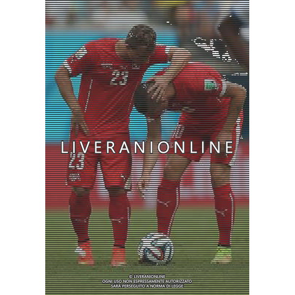 (140625) -- MANAUS, June 25, 2014 () -- Switzerland\'s Xherdan Shaqiri (L) speaks with Granit Xhaka before making a free kick during a Group E match between Honduras and Switzerland of 2014 FIFA World Cup at the Arena Amazonia Stadium in Manaus, Brazil, on June 25, 2014.(/Li Ming)(pcy) AG ALDO LIVERANI SAS ONLY ITALY