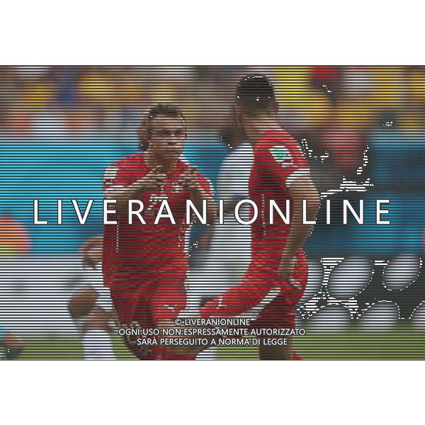 (140625) -- MANAUS, June 25, 2014 () -- Switzerland\'s Xherdan Shaqiri (L, front) celebrates for his second goal during a Group E match between Honduras and Switzerland of 2014 FIFA World Cup at the Arena Amazonia Stadium in Manaus, Brazil, on June 25, 2014.(/Li Ming)(pcy) AG ALDO LIVERANI SAS ONLY ITALY